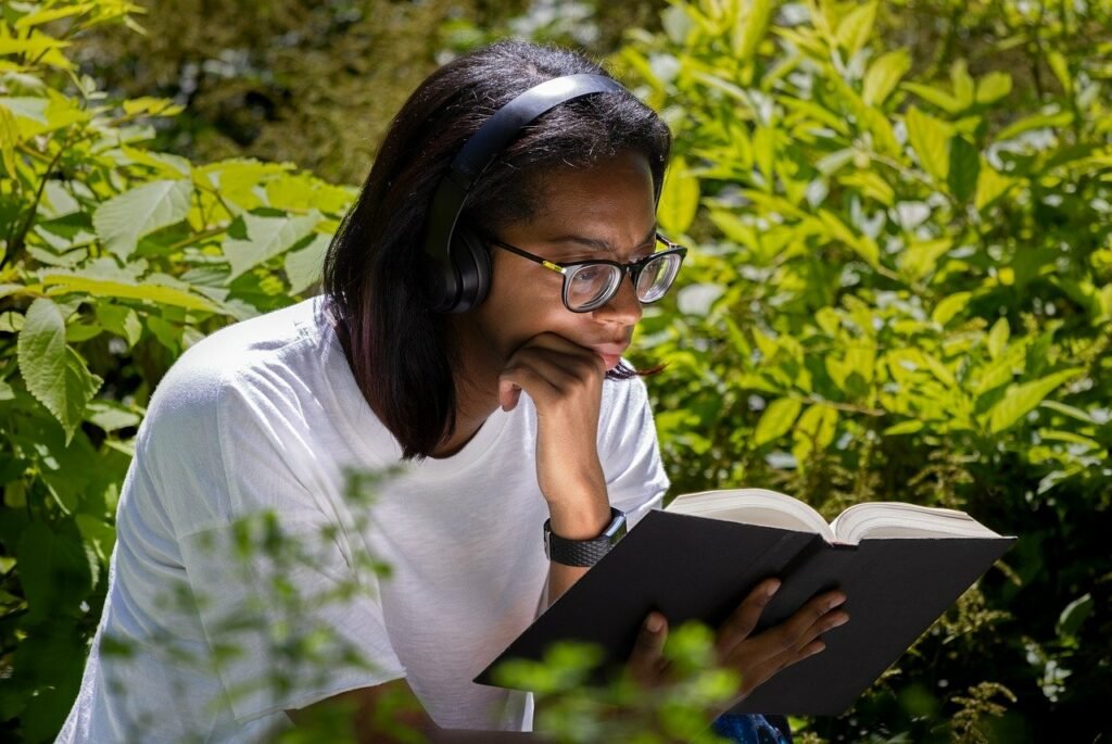 A picture of a woman reading a book.